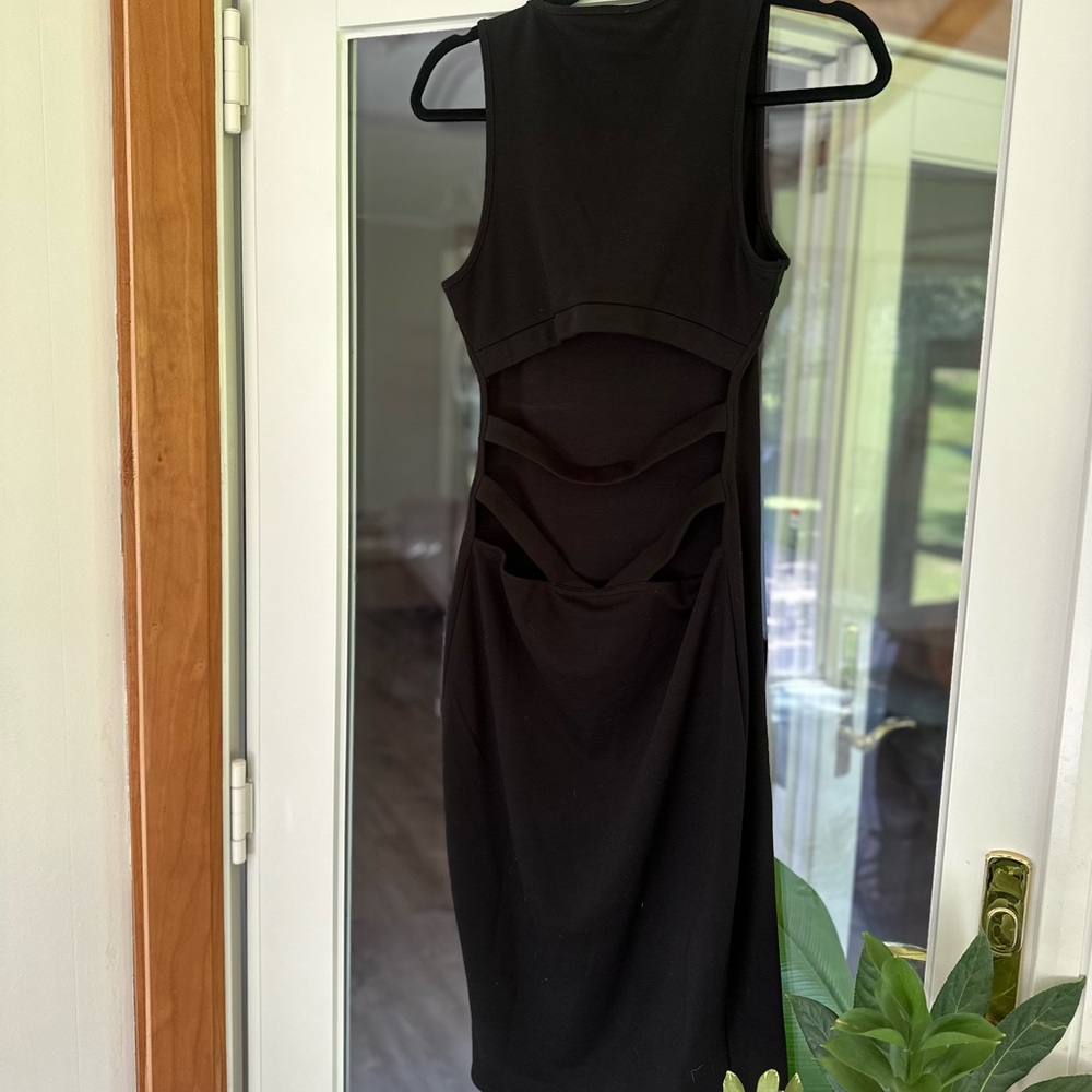 Black, cut-our back detailed midi dress.